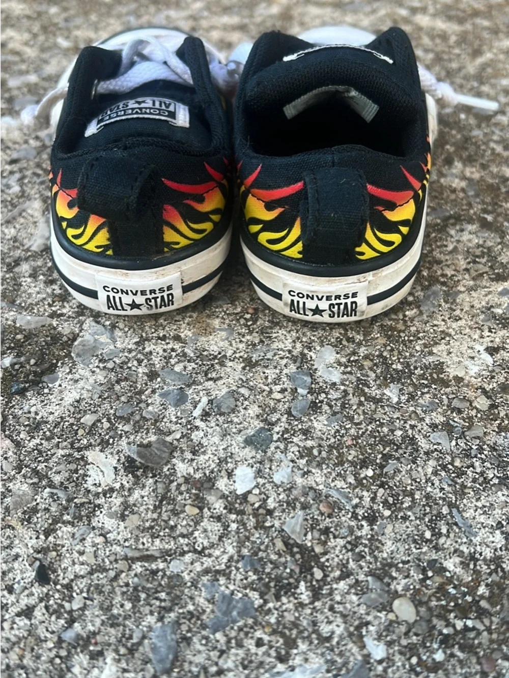 Converse Kids Low-Top Sneakers in Black with Red and Yellow Flame Print